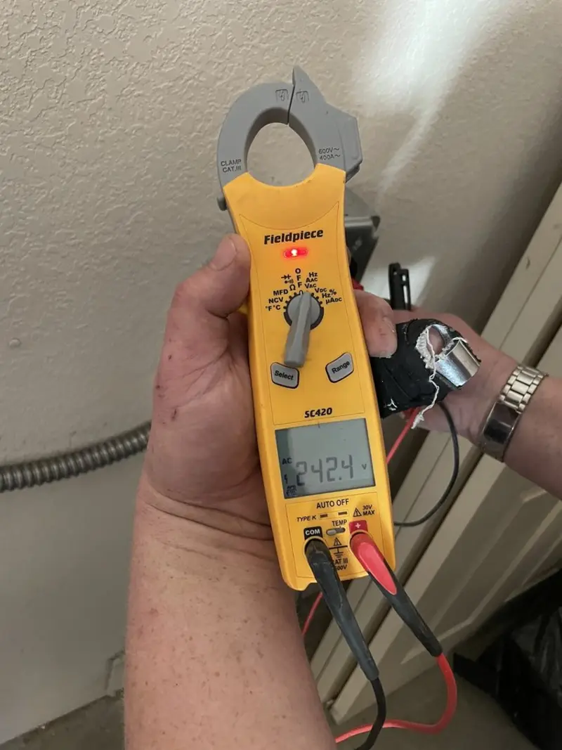 Voltage testing with clamp meter during Hot Tub / Pool Electrical Wiring in Fulton